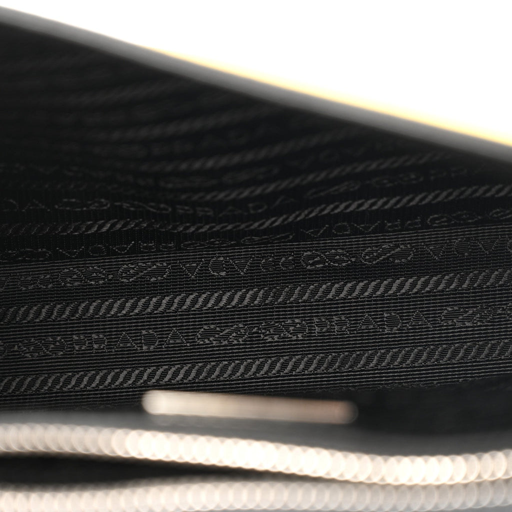 Saffiano Cuir Triangle Logo Embossed Flap Crossbody Sole