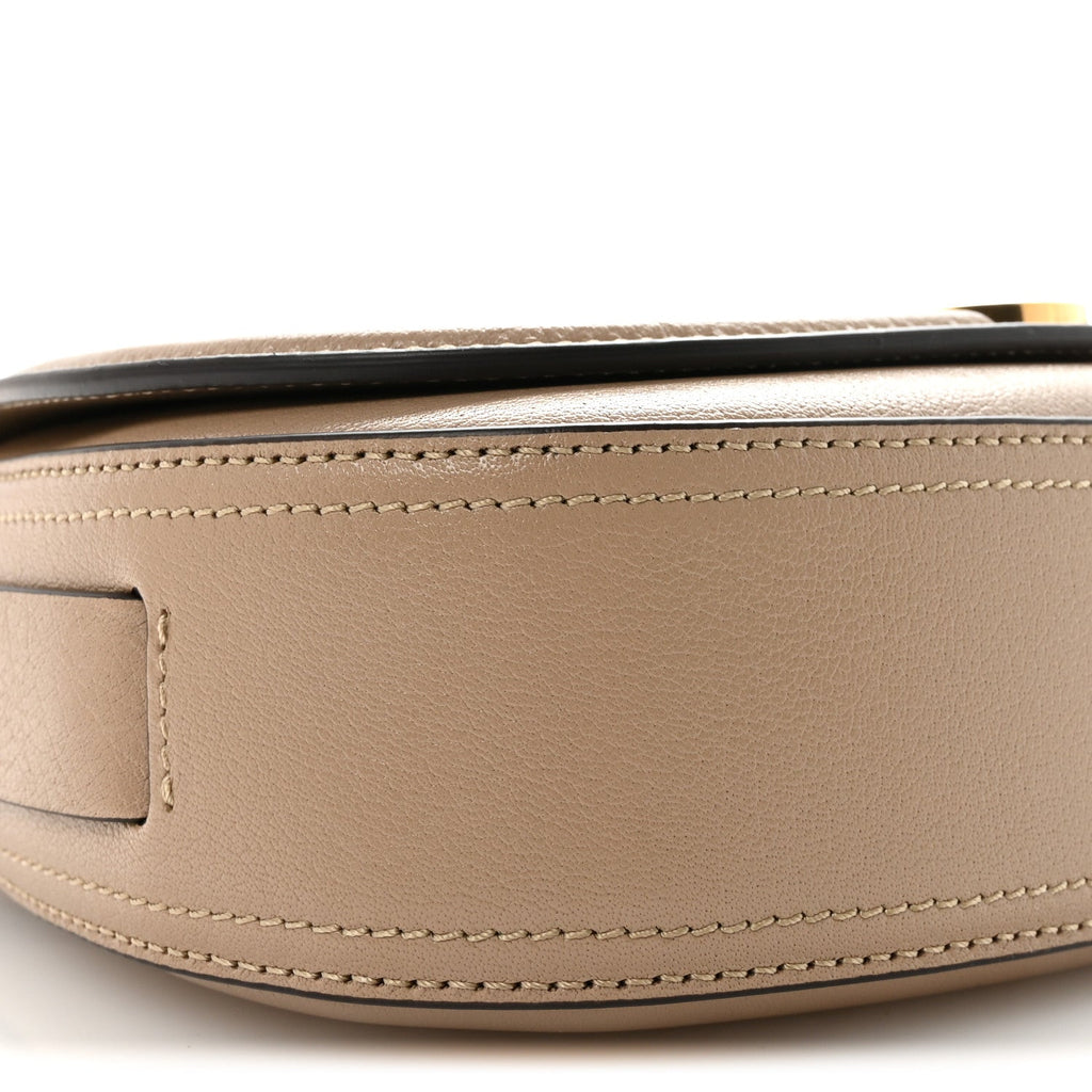 Grained Asian Water Buffalo Horse Medal Saddle Crossbody Bag Boyish Brown