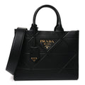 Soft Calfskin Triangolo Symbole Embossed Small Tote Black