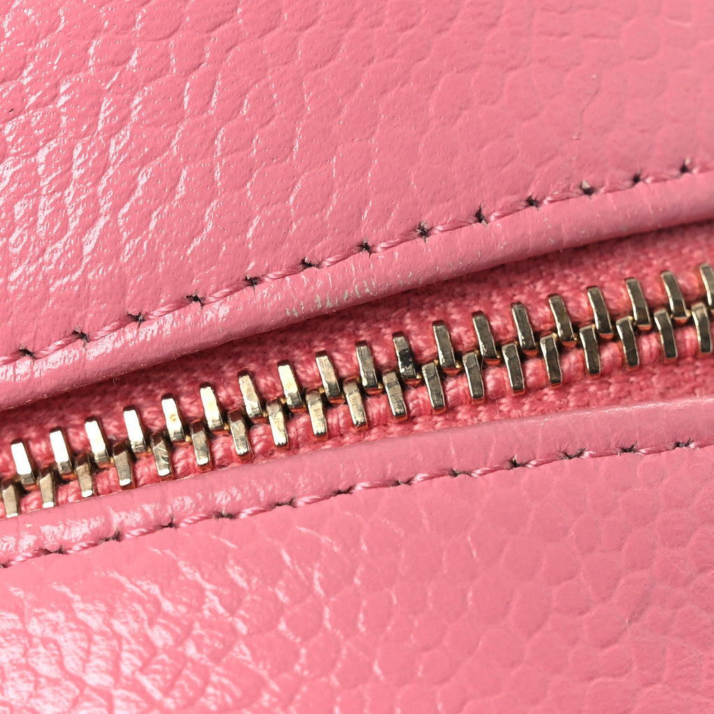 Caviar Camellia Embossed Round Clutch With Chain Pink