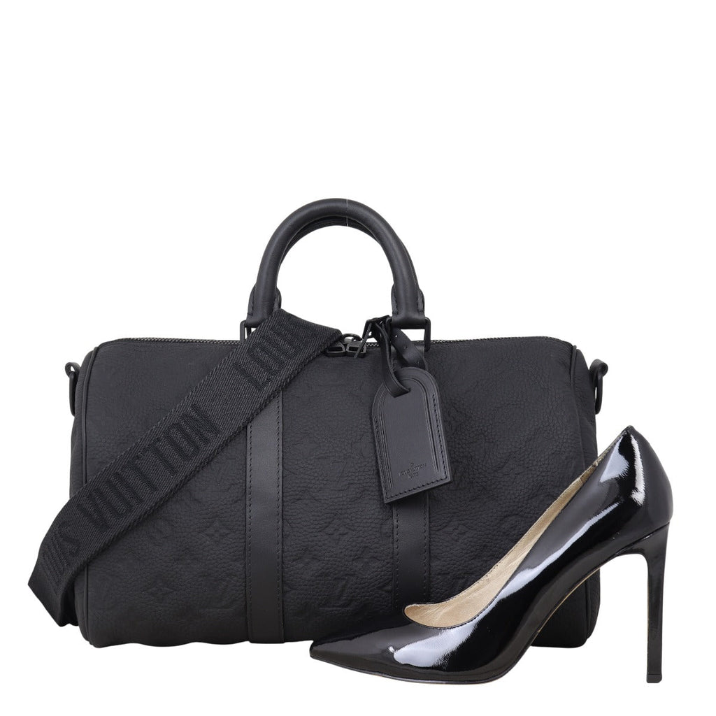 Louis Vuitton Keepall 35 Bandouliere Monogram Taurillon