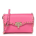 Pebbled Calfskin Medium Rockstud Flip Lock Crossbody Bag Feminine Pink