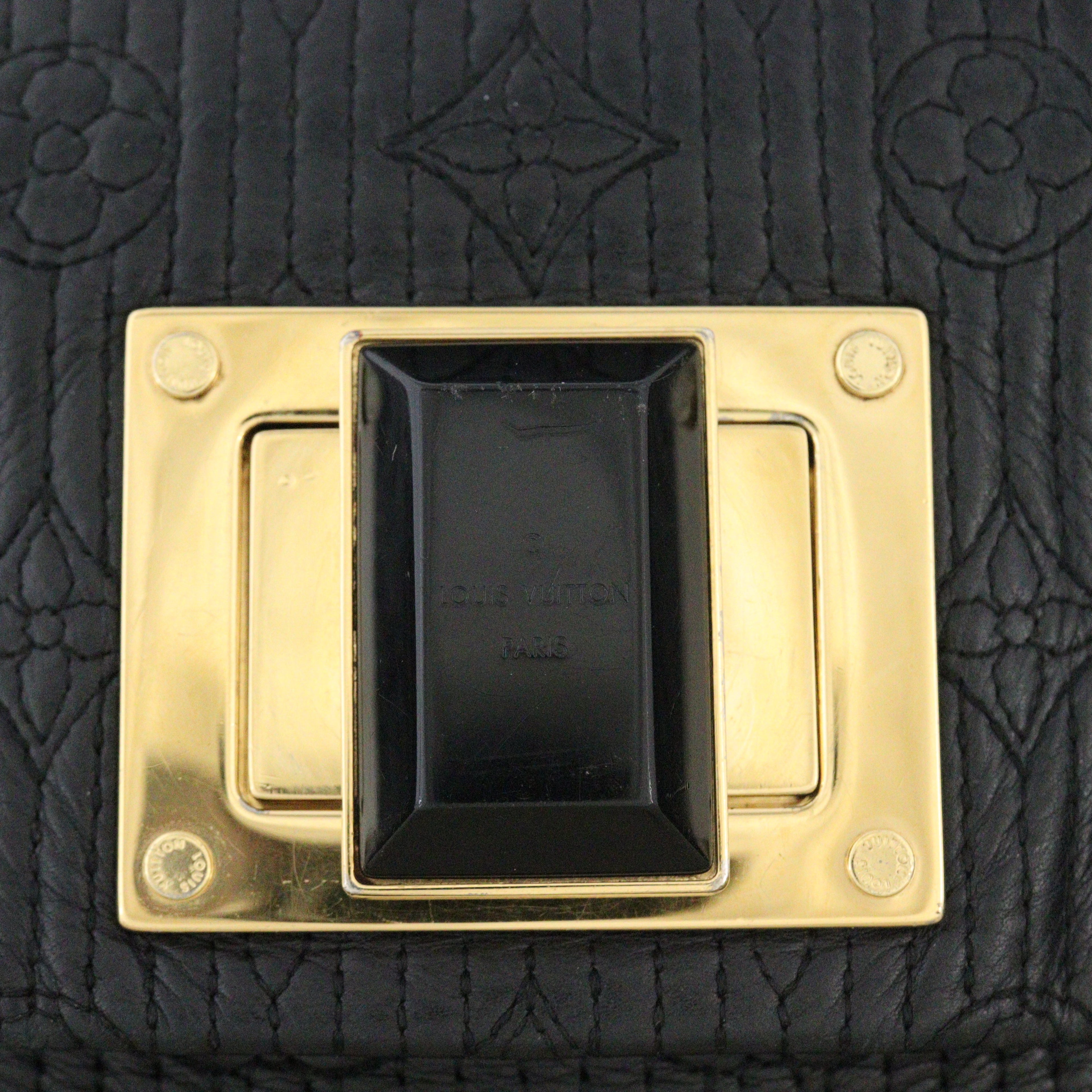 Louis Vuitton Altair Clutch Monogram Motard