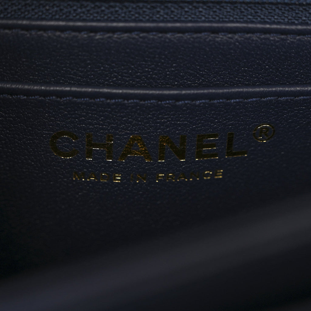 Shiny Caviar Quilted Mini Top Handle Flap Navy Blue