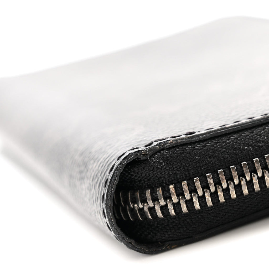 Monogram Eclipse Vertical Zippy Wallet