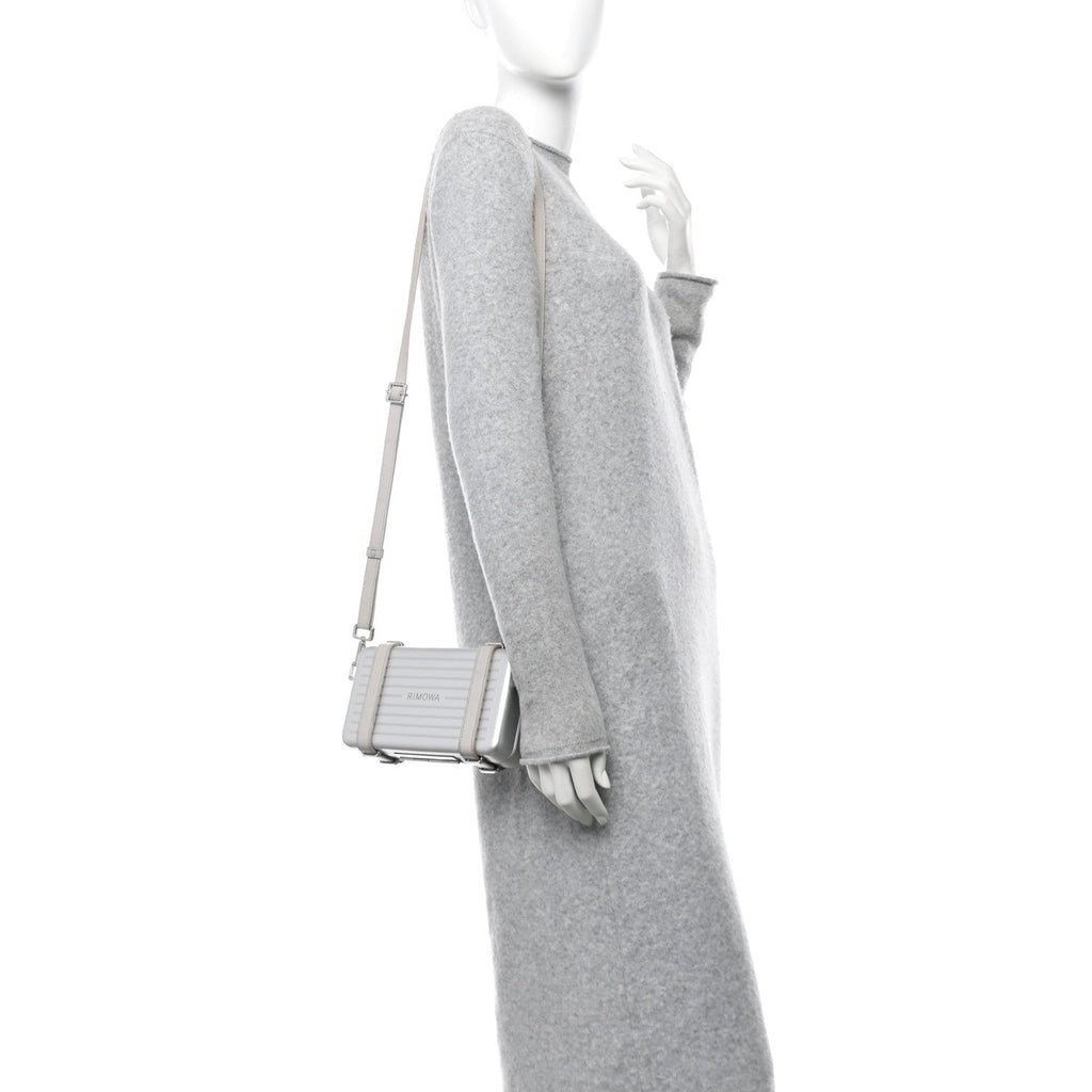 X RIMOWA Aluminum Personal Clutch On Strap Silver