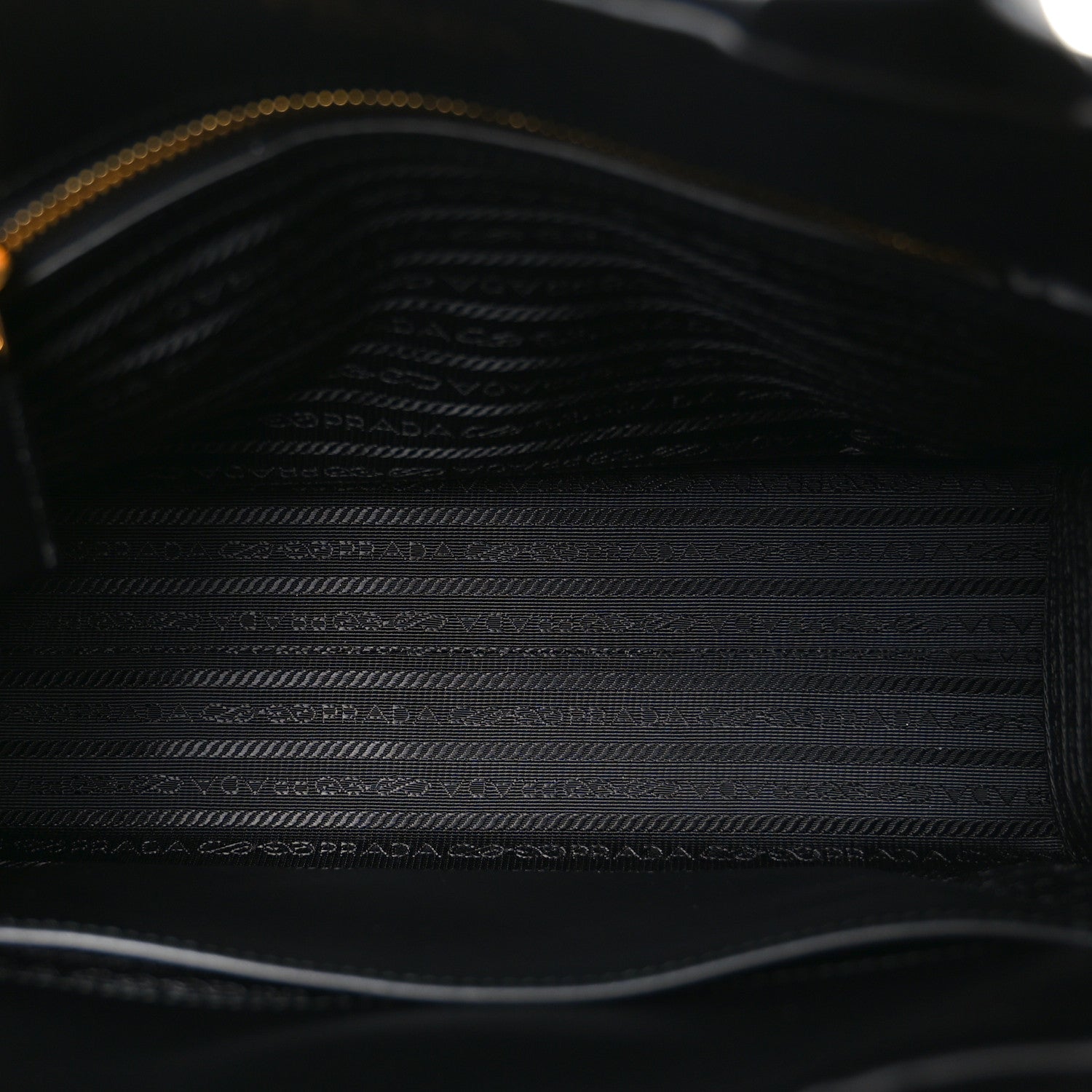 Soft Calfskin Triangolo Symbole Embossed Small Tote Black