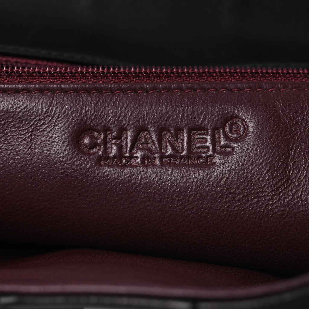 Lambskin Vertical Quilted Clutch Black