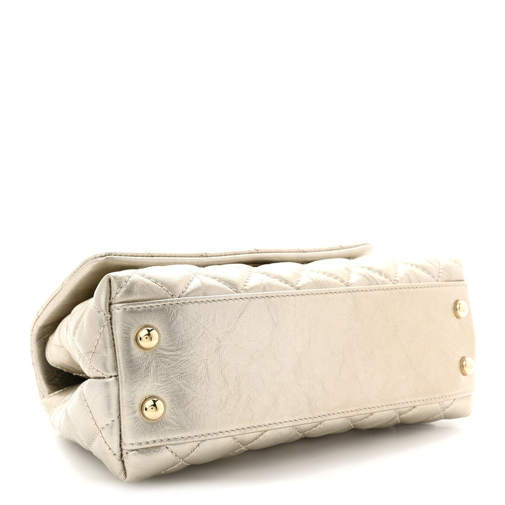 Metallic Aged Calfskin Quilted Mini Coco Handle Flap Gold