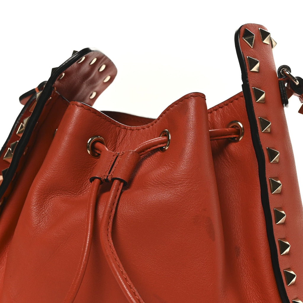 Grained Calfskin Rockstud Bucket Bag Orange