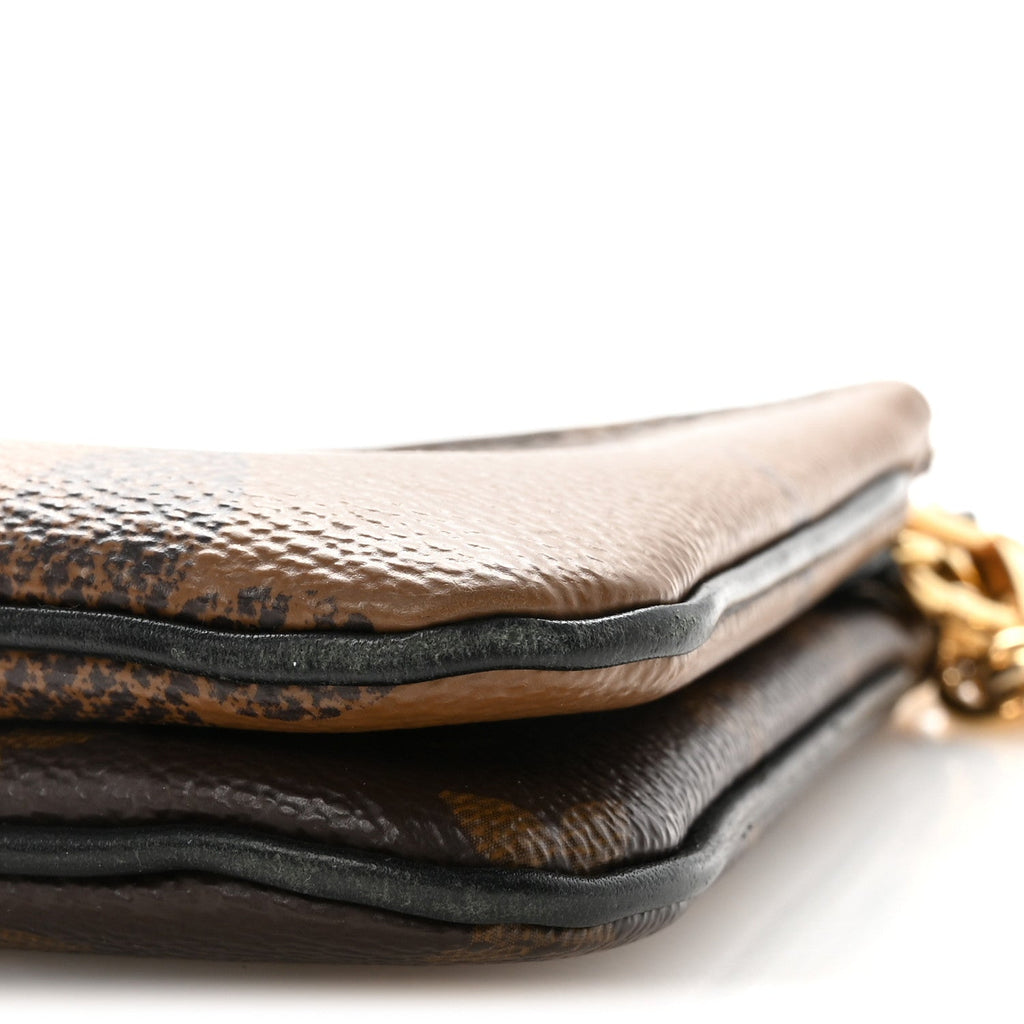 Reverse Monogram Giant Double Zip Pochette