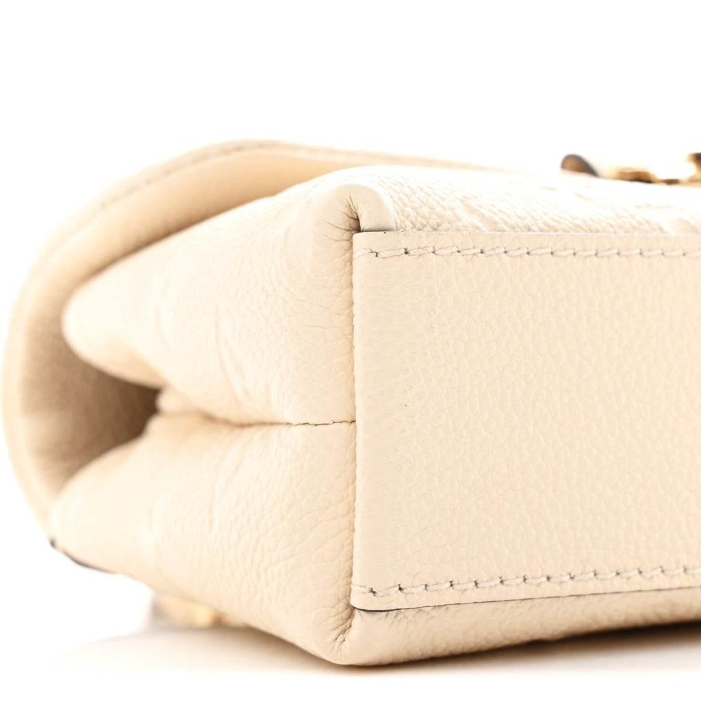 Empreinte Monogram Nano Madeleine Creme