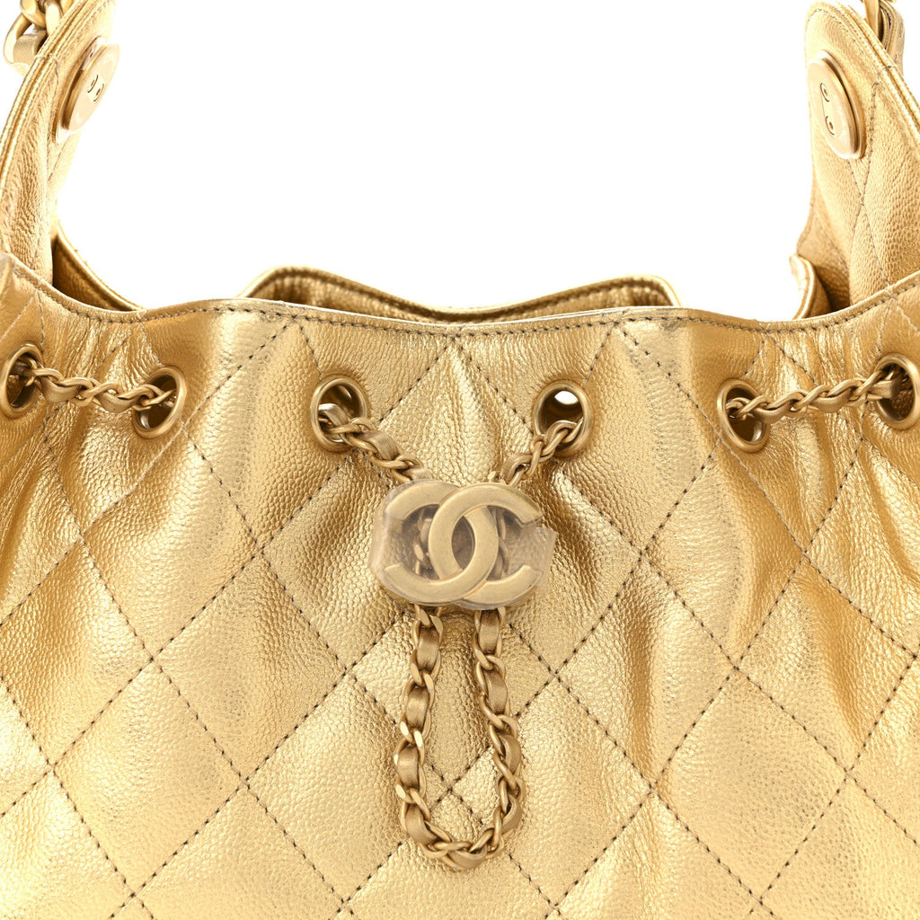 Metallic Caviar Quilted Mini Chanel 25 Handbag Gold
