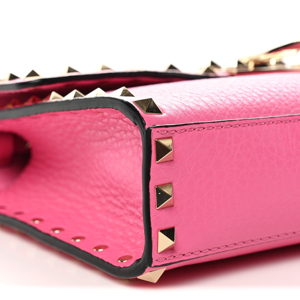 Pebbled Calfskin Medium Rockstud Flip Lock Crossbody Bag Feminine Pink