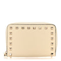Pebbled Calfskin Rockstud Compact Zip Around Wallet Light Ivory