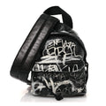 Agneau Arena Graffiti All Over Mini Explorer Crossbody Backpack  Black White