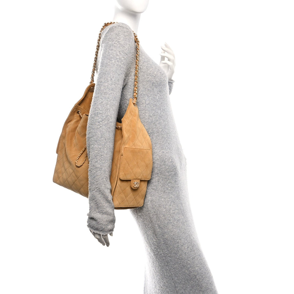 Suede Quilted Medium Chanel 25 Handbag Beige