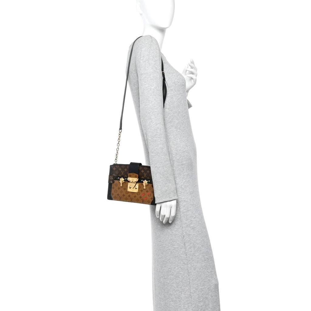 Reverse Monogram Trunk Clutch