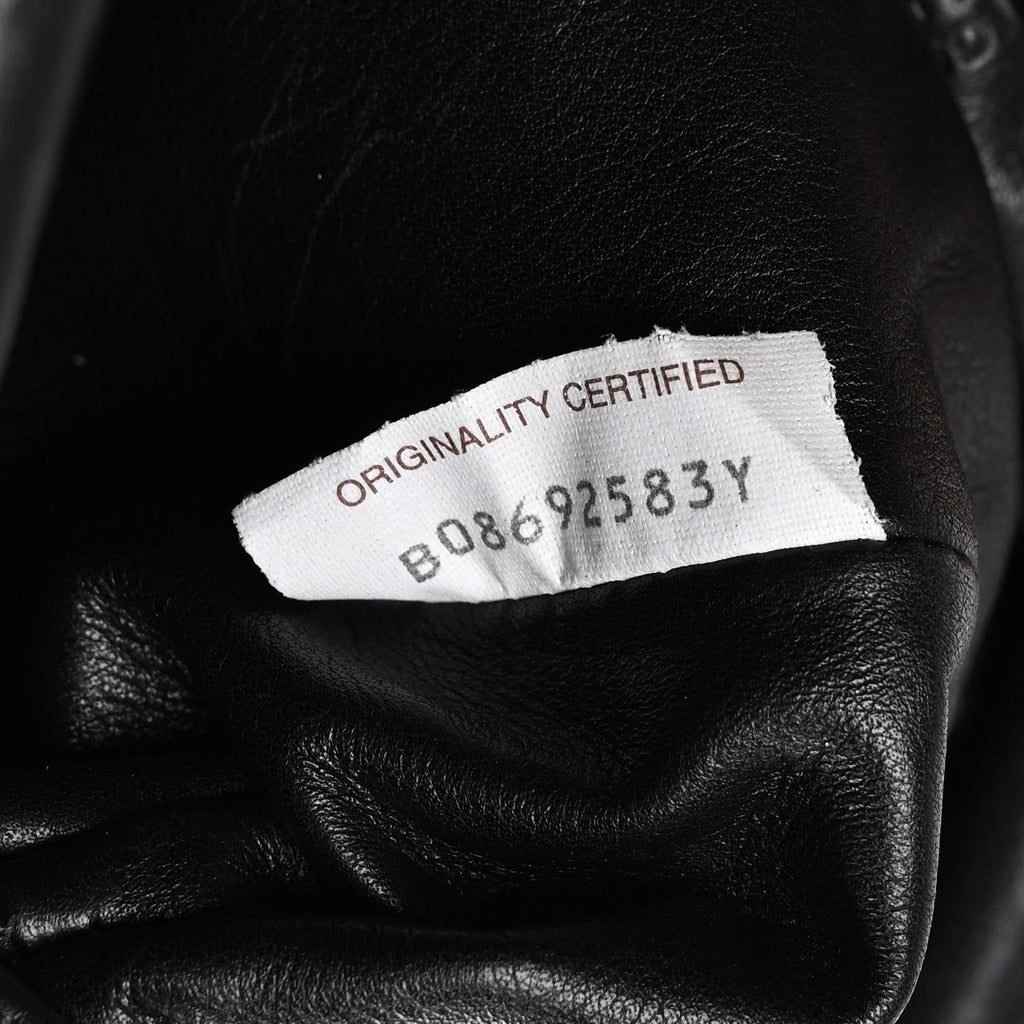 Butter Calfskin The Mini Pouch Black