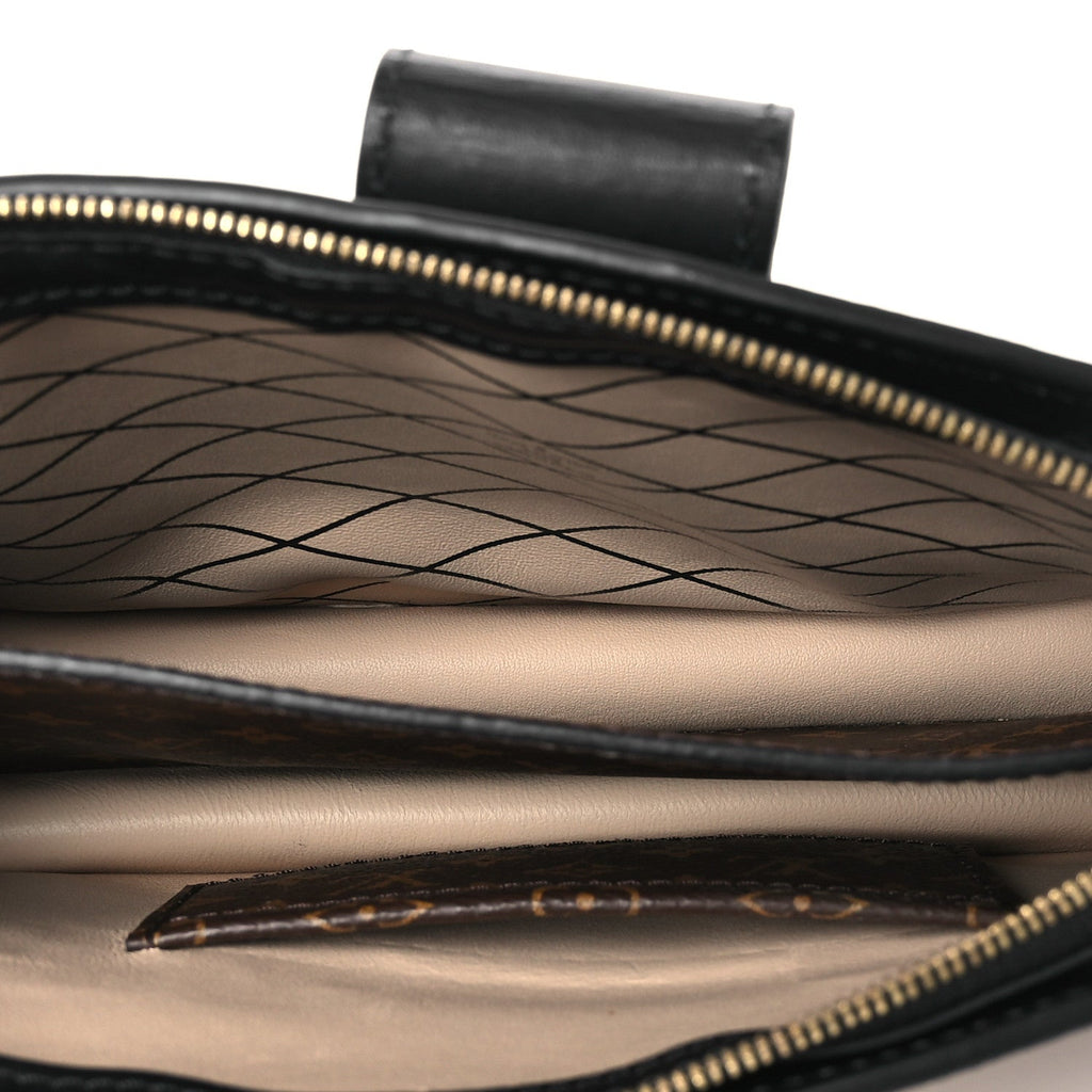 Reverse Monogram Trunk Clutch