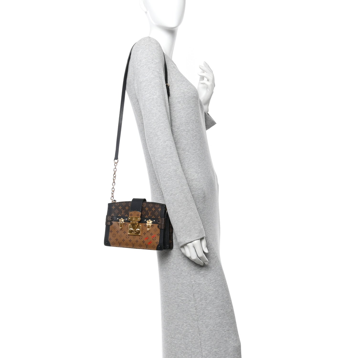 Reverse Monogram Trunk Clutch