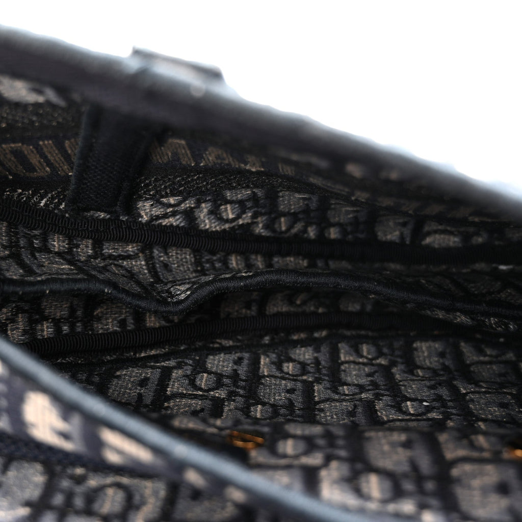 Oblique Embroidered Saddle Bag Blue