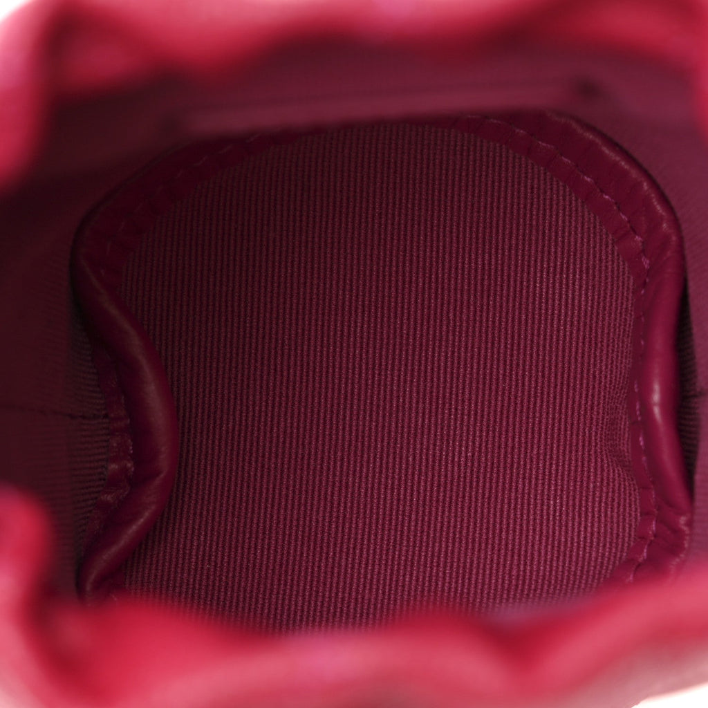Caviar Quilted Twist Your Buttons Mini Bucket Bag Fuchsia