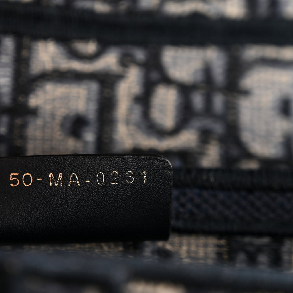 Oblique Embroidered Saddle Bag Blue