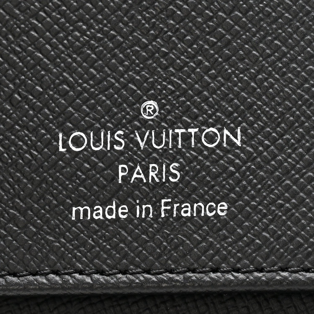 Monogram Eclipse Vertical Zippy Wallet