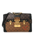 Reverse Monogram Trunk Clutch