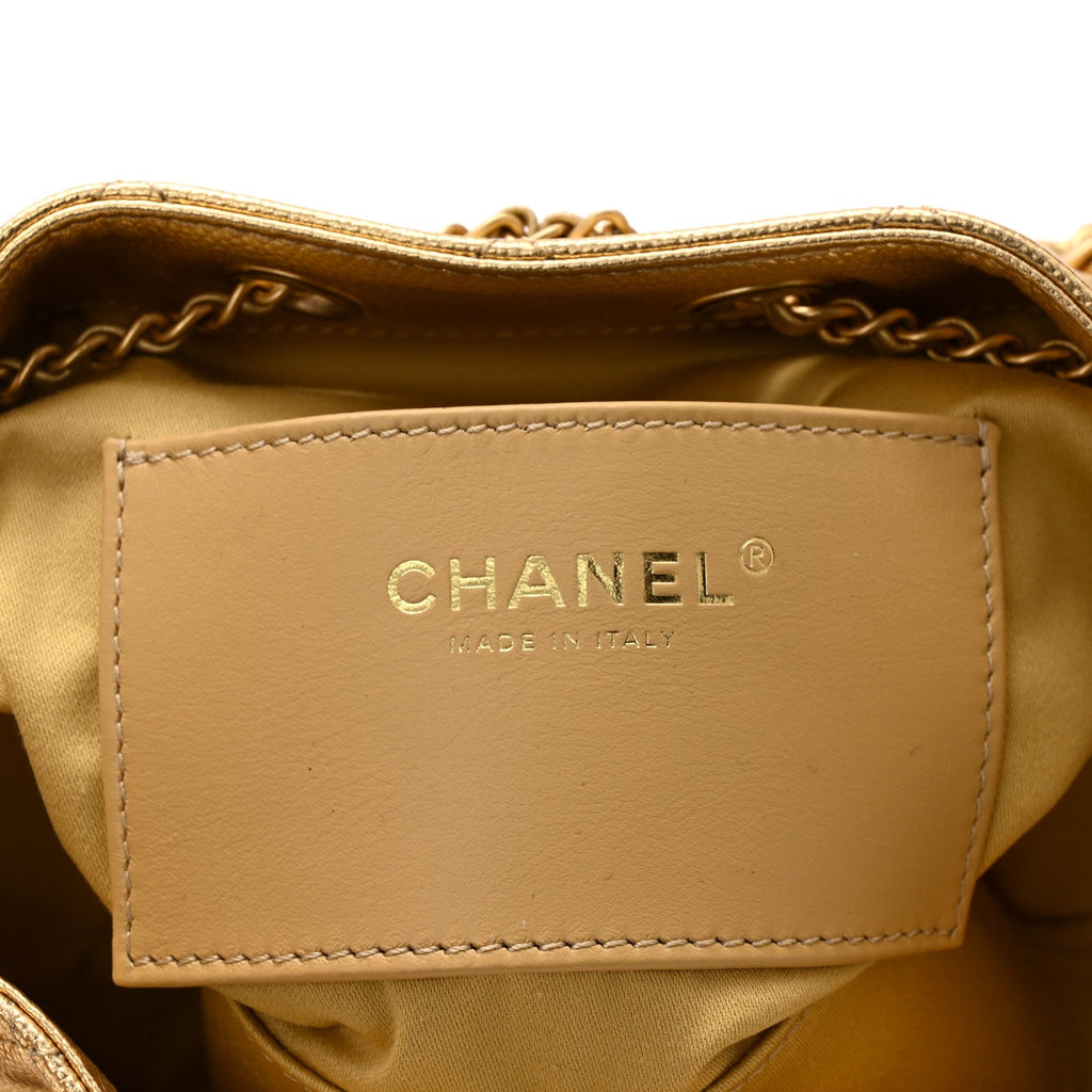 Metallic Caviar Quilted Mini Chanel 25 Handbag Gold