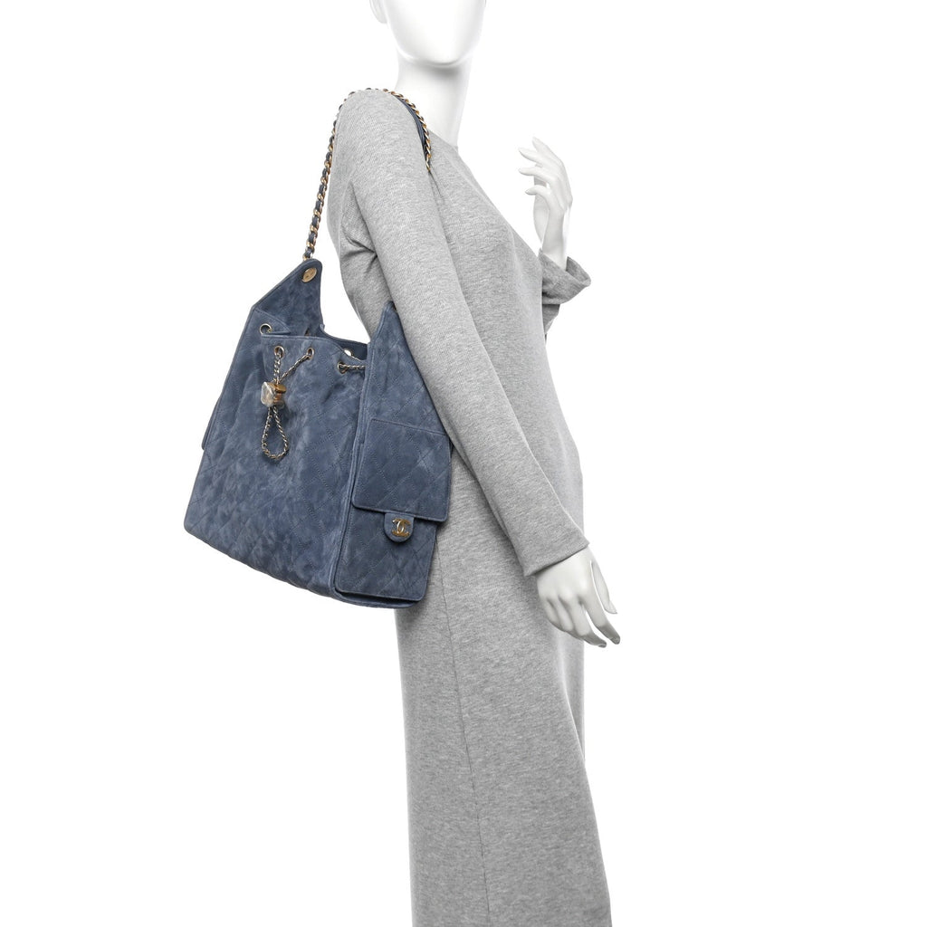 Suede Quilted Medium Chanel 25 Handbag Blue