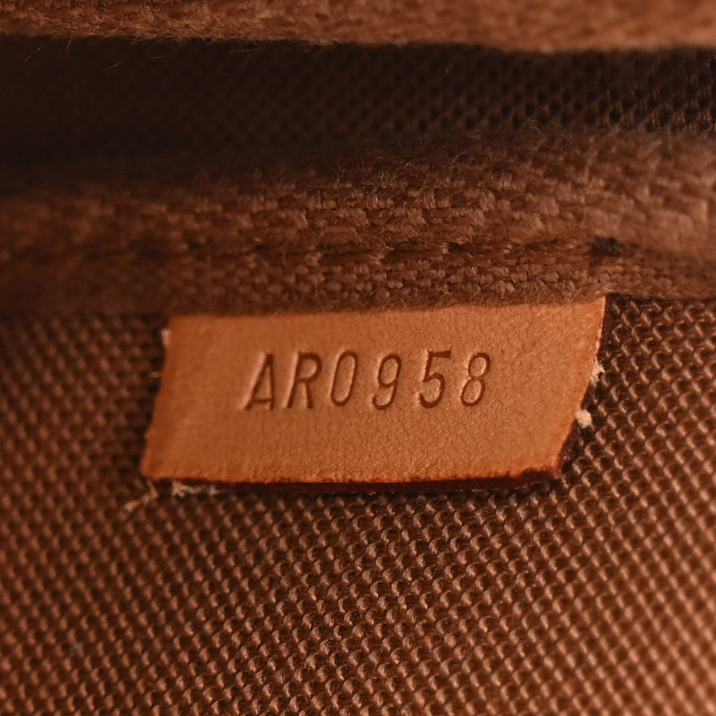 Monogram Pochette Wristlet