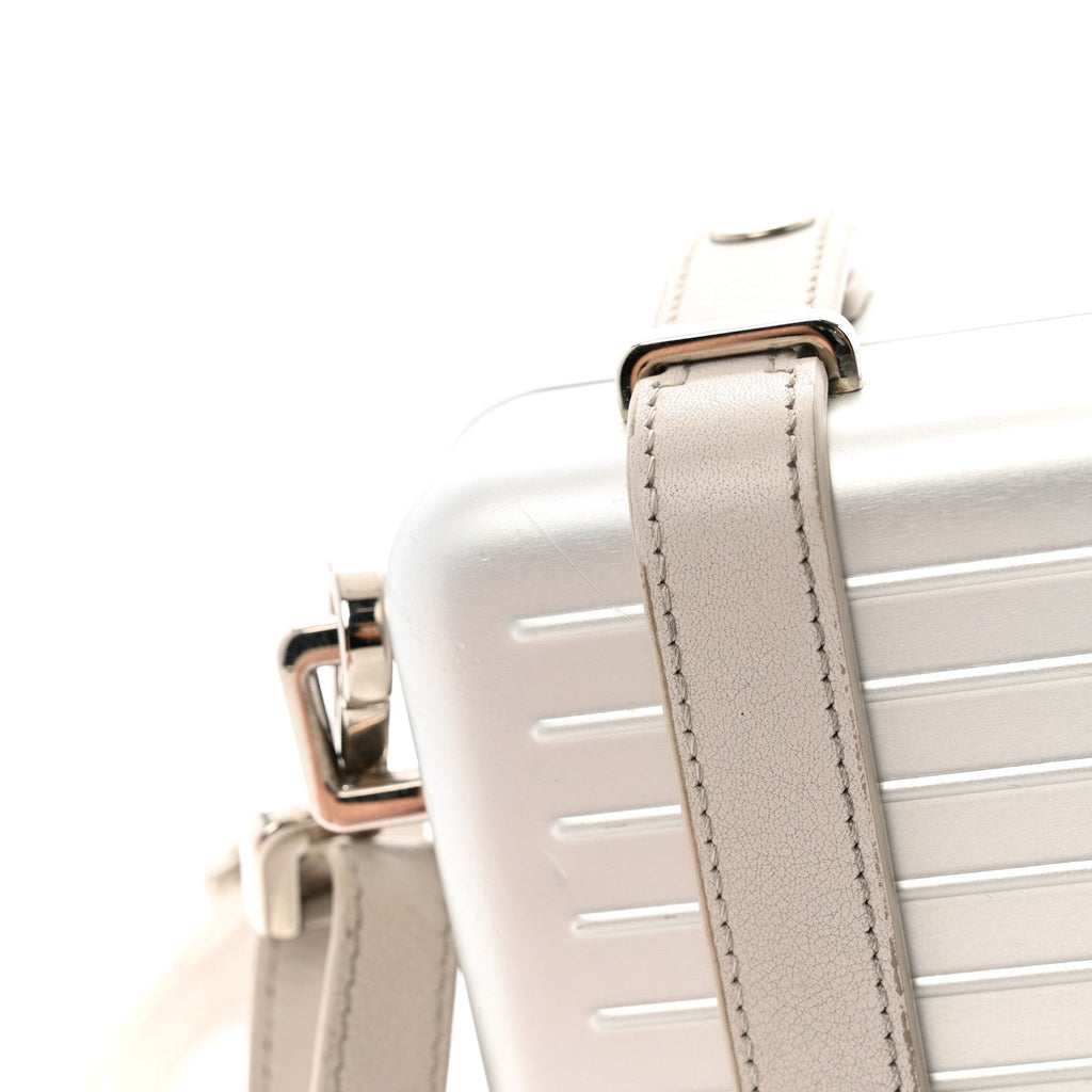 X RIMOWA Aluminum Personal Clutch On Strap Silver