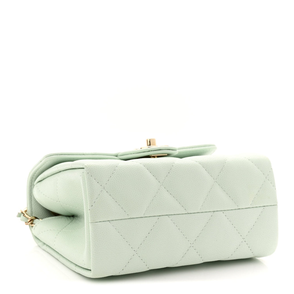 Caviar Quilted Retro Twist Top Handle Clutch Light Green