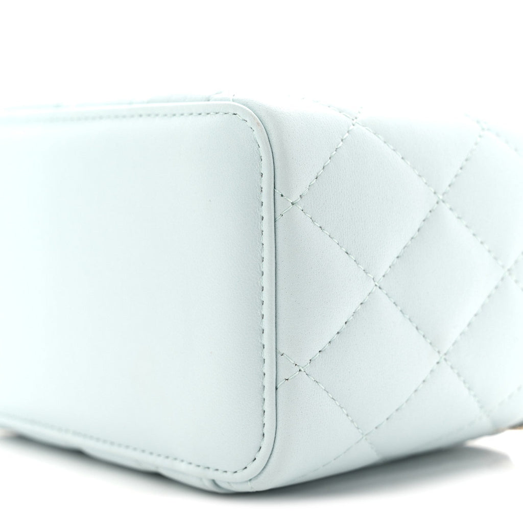 Lambskin Quilted Small Top Handle Vanity Case With Chain Light Blue