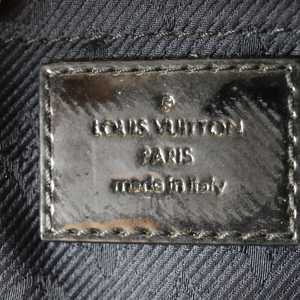 Louis Vuitton Altair Clutch Monogram Motard