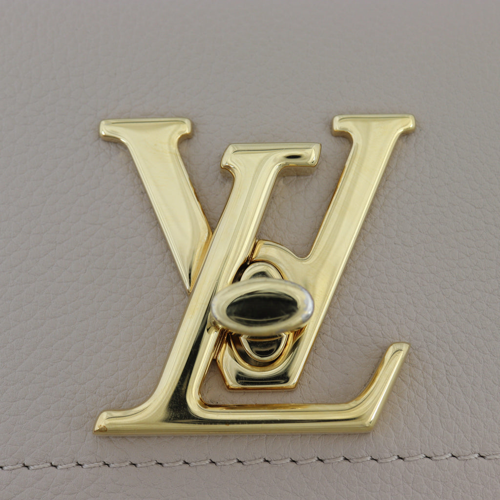 Louis Vuitton LockMe Tender