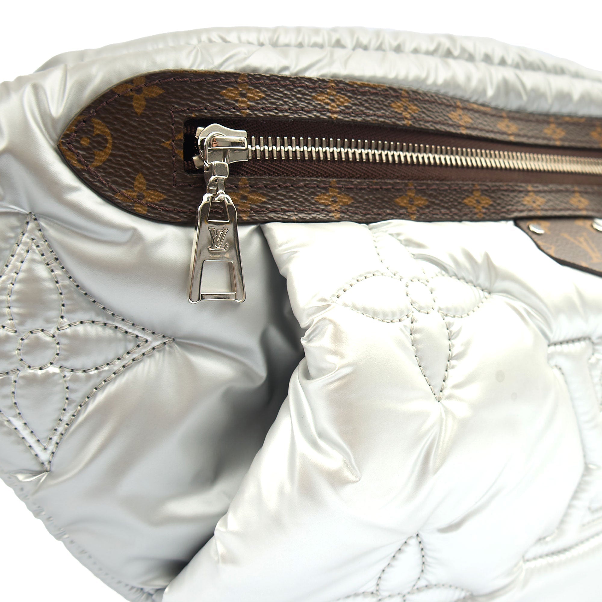 Louis Vuitton Cross Body Bumbag in Metallic, Fabric