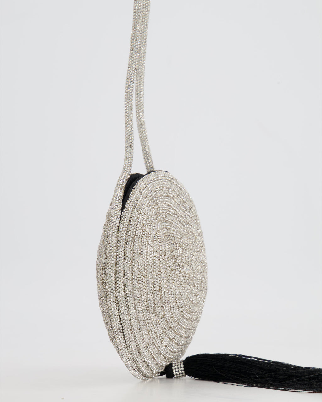 Nué Crystal Spiral Round Small Bag with Black Tassel Detail RRP £640