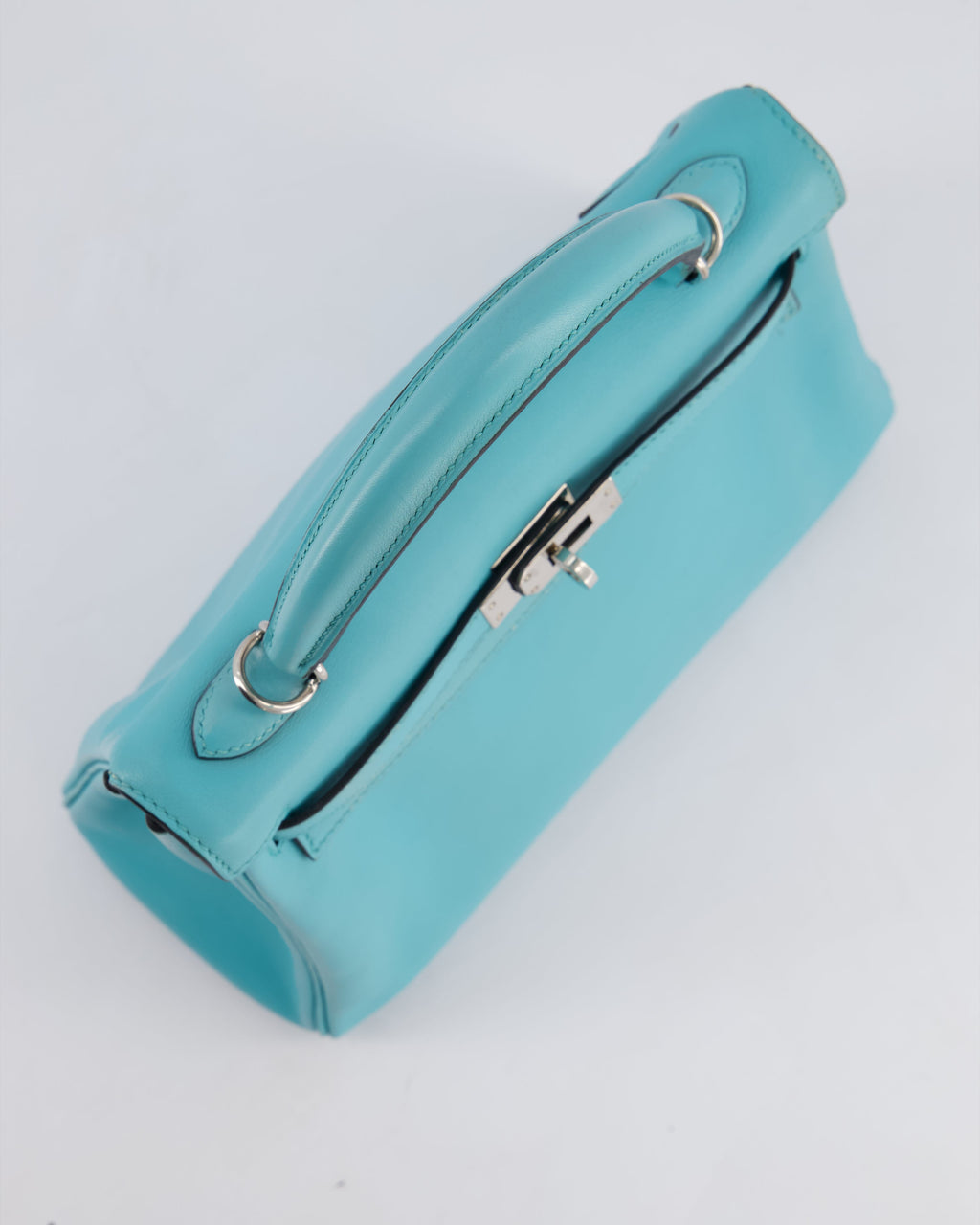 Hermès Kelly 25 Retourne Bag in Bleu Atoll Swift Leather with Palladium Hardware