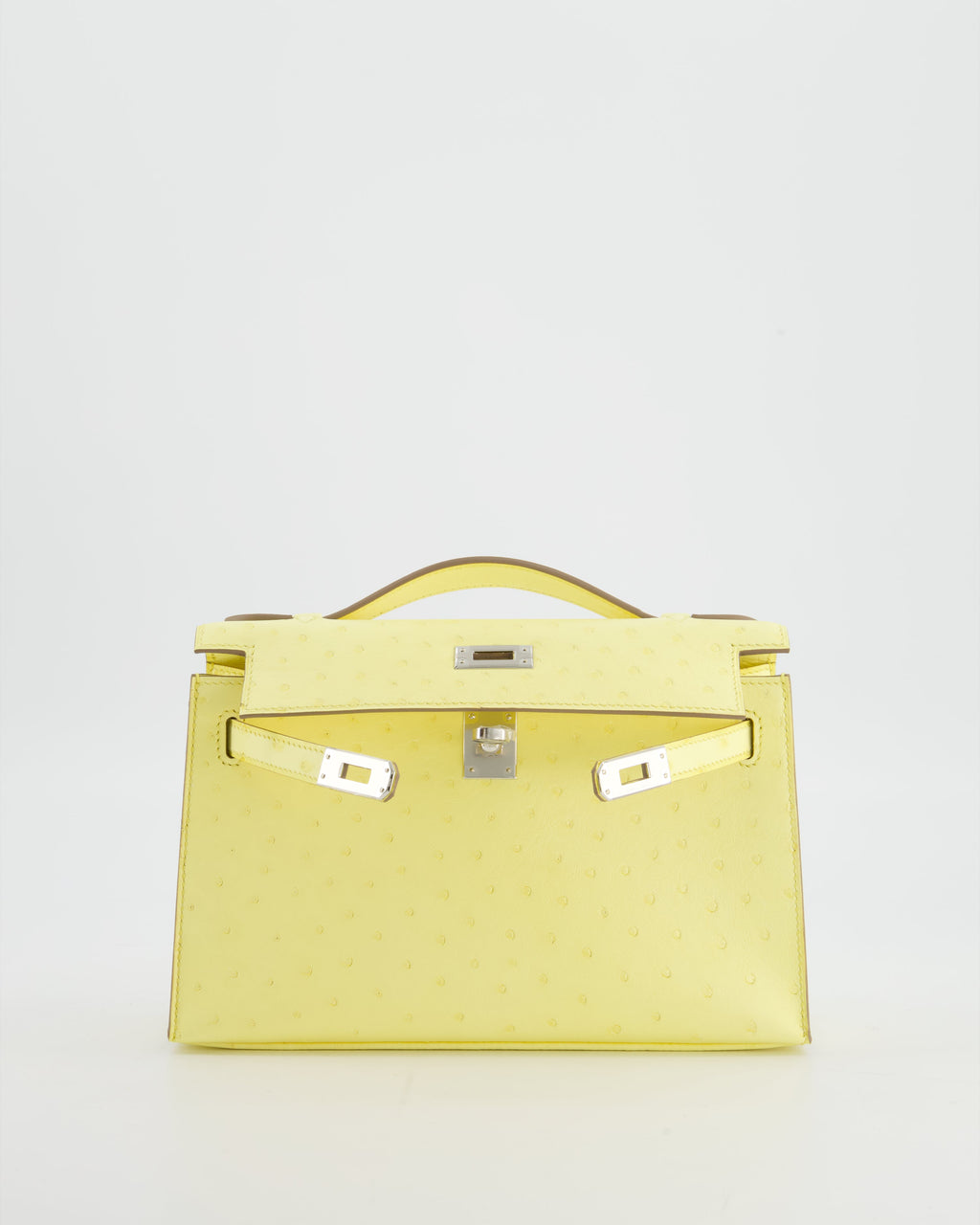 Hermès Kelly Pochette Bag in Limoncello Ostrich Leather with Palladium Hardware