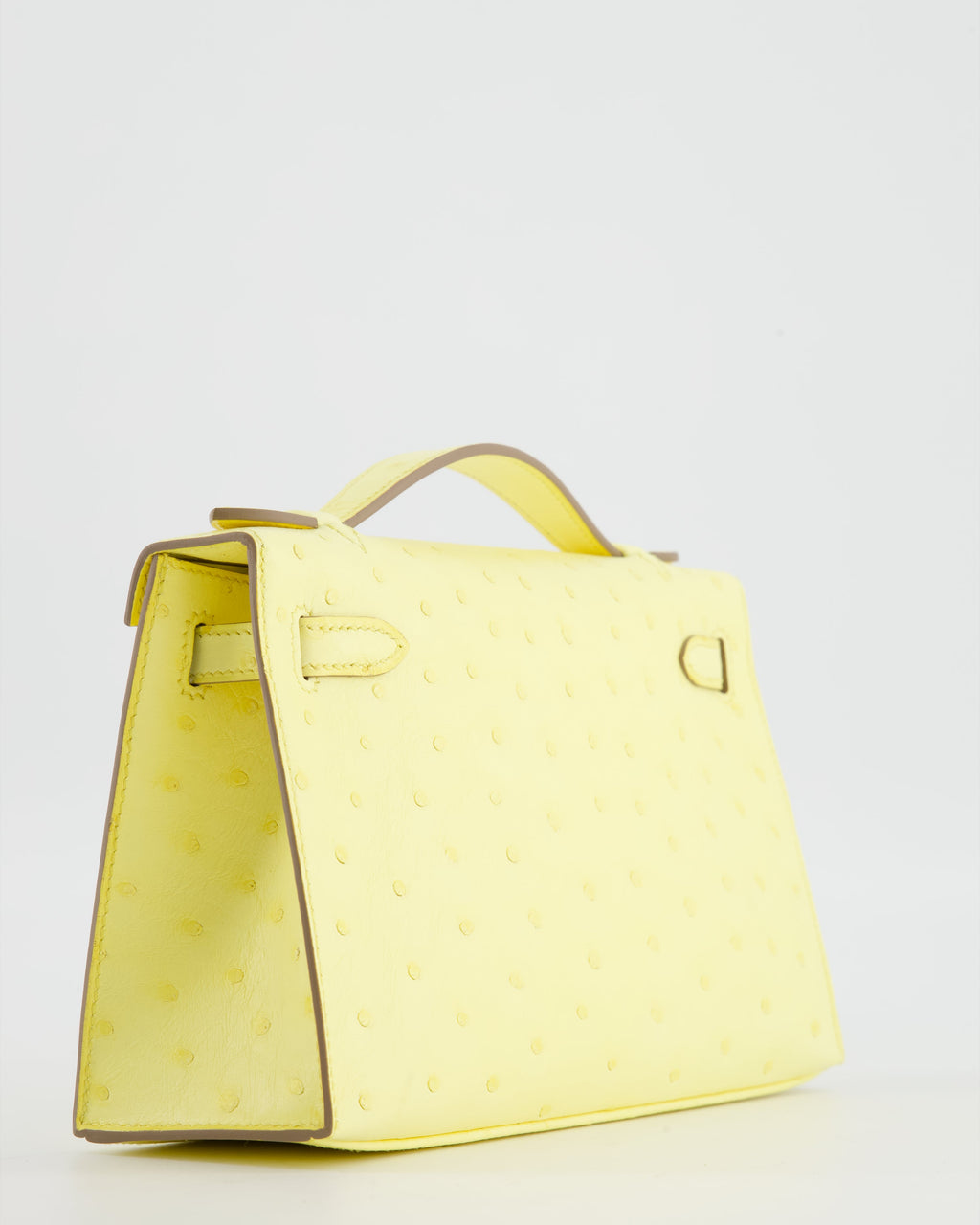 Hermès Kelly Pochette Bag in Limoncello Ostrich Leather with Palladium Hardware