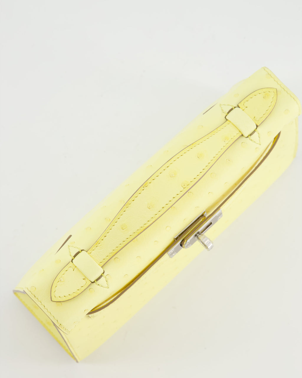 Hermès Kelly Pochette Bag in Limoncello Ostrich Leather with Palladium Hardware