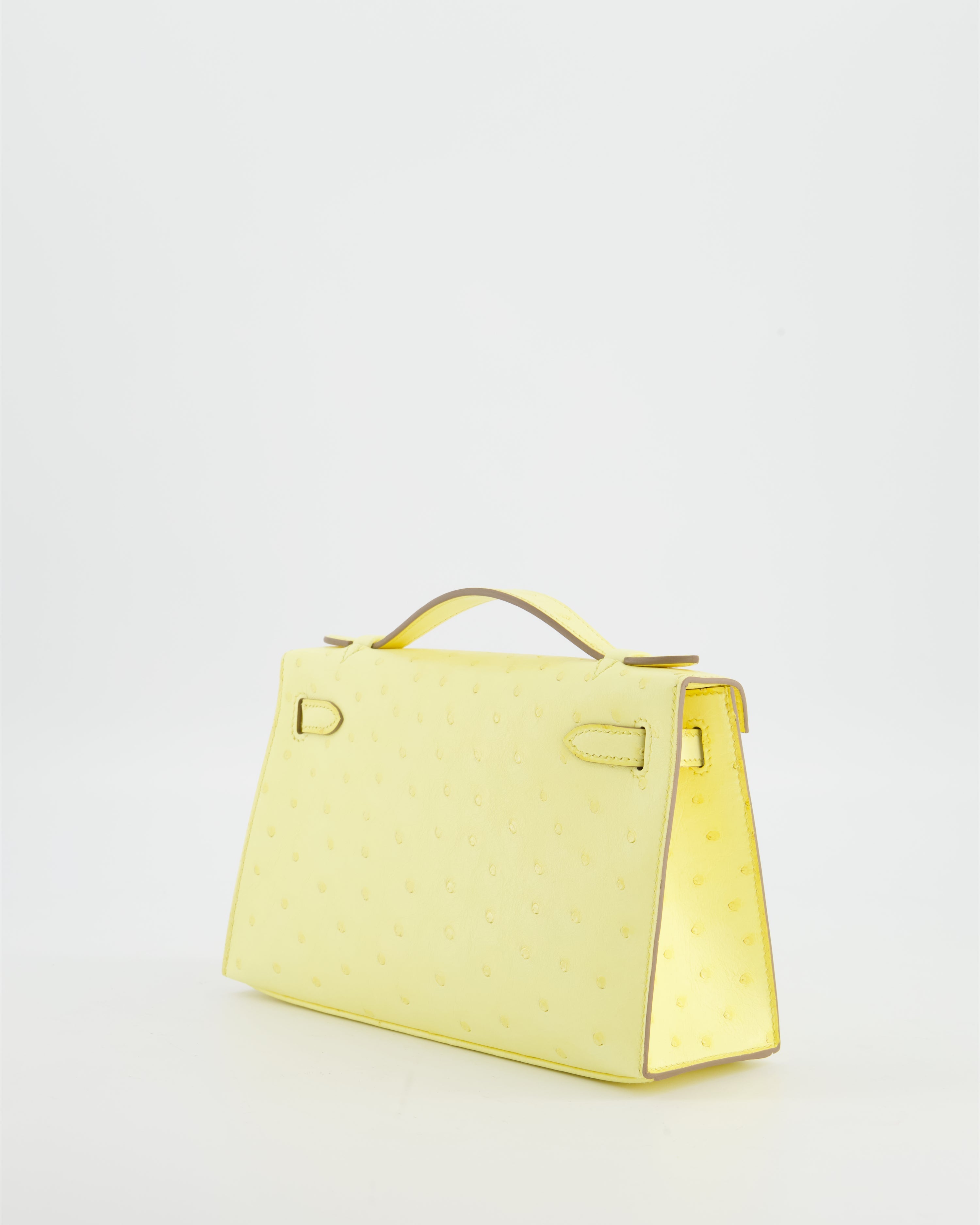 Hermès Kelly Pochette Bag in Limoncello Ostrich Leather with Palladium Hardware