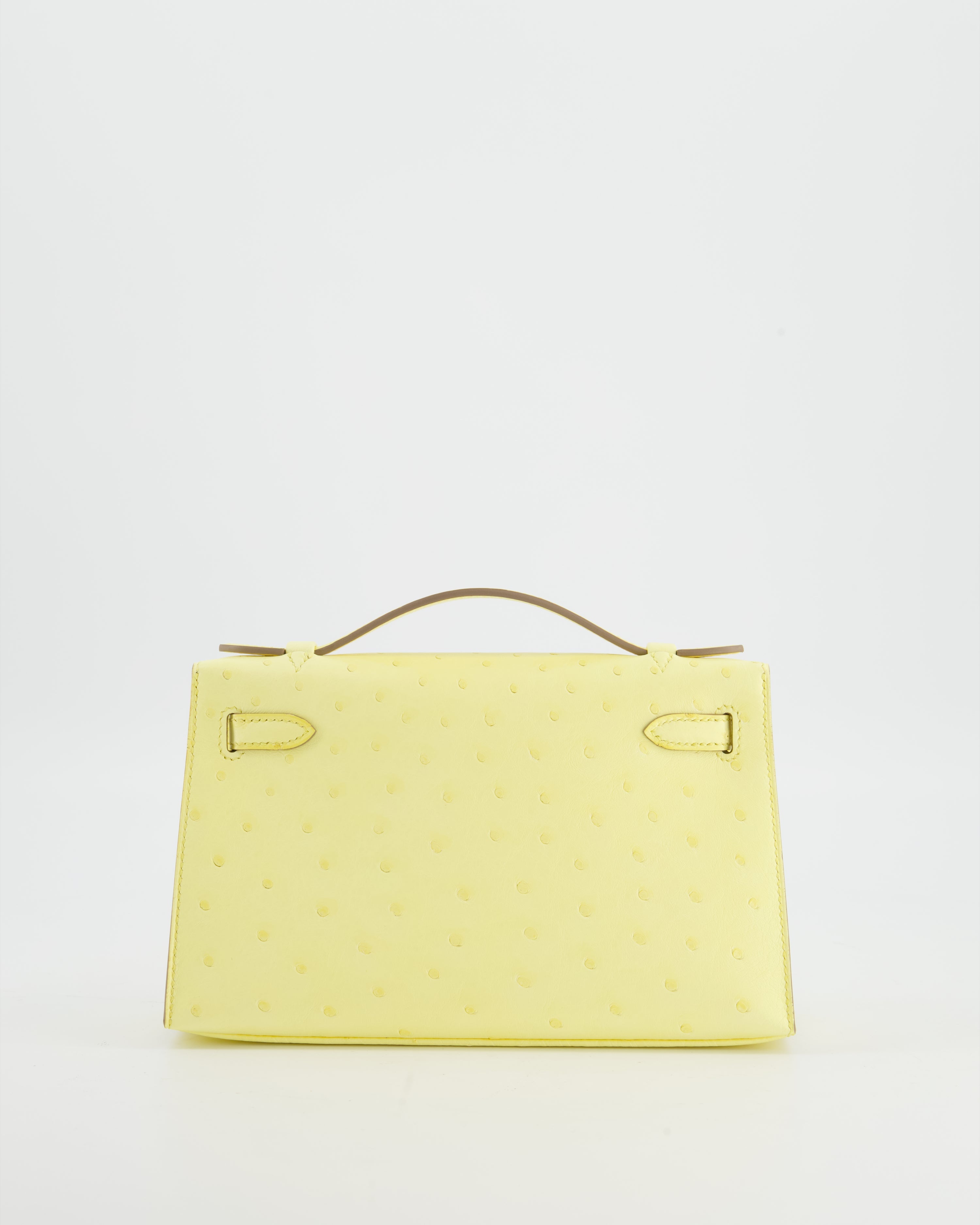 Hermès Kelly Pochette Bag in Limoncello Ostrich Leather with Palladium Hardware