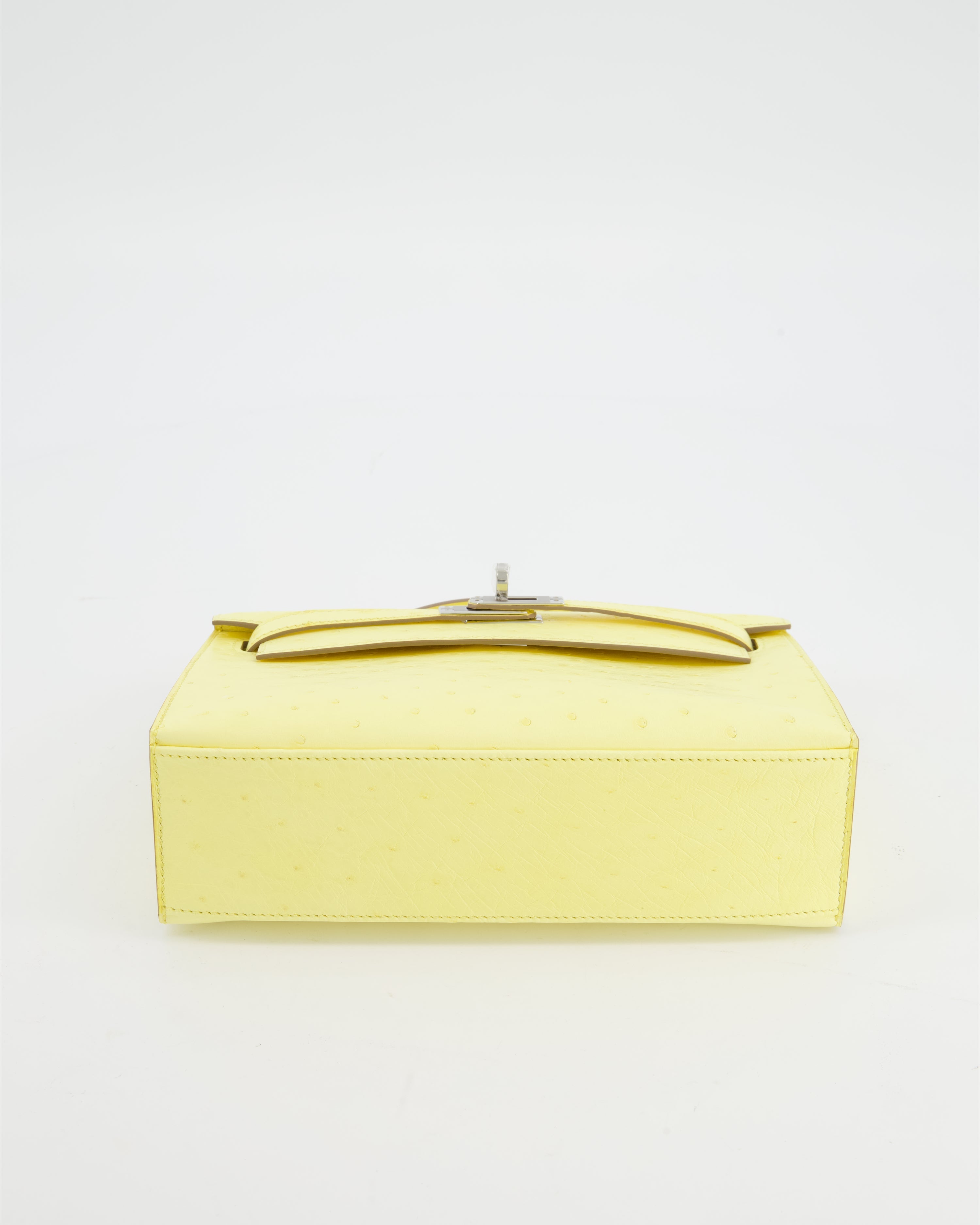 Hermès Kelly Pochette Bag in Limoncello Ostrich Leather with Palladium Hardware