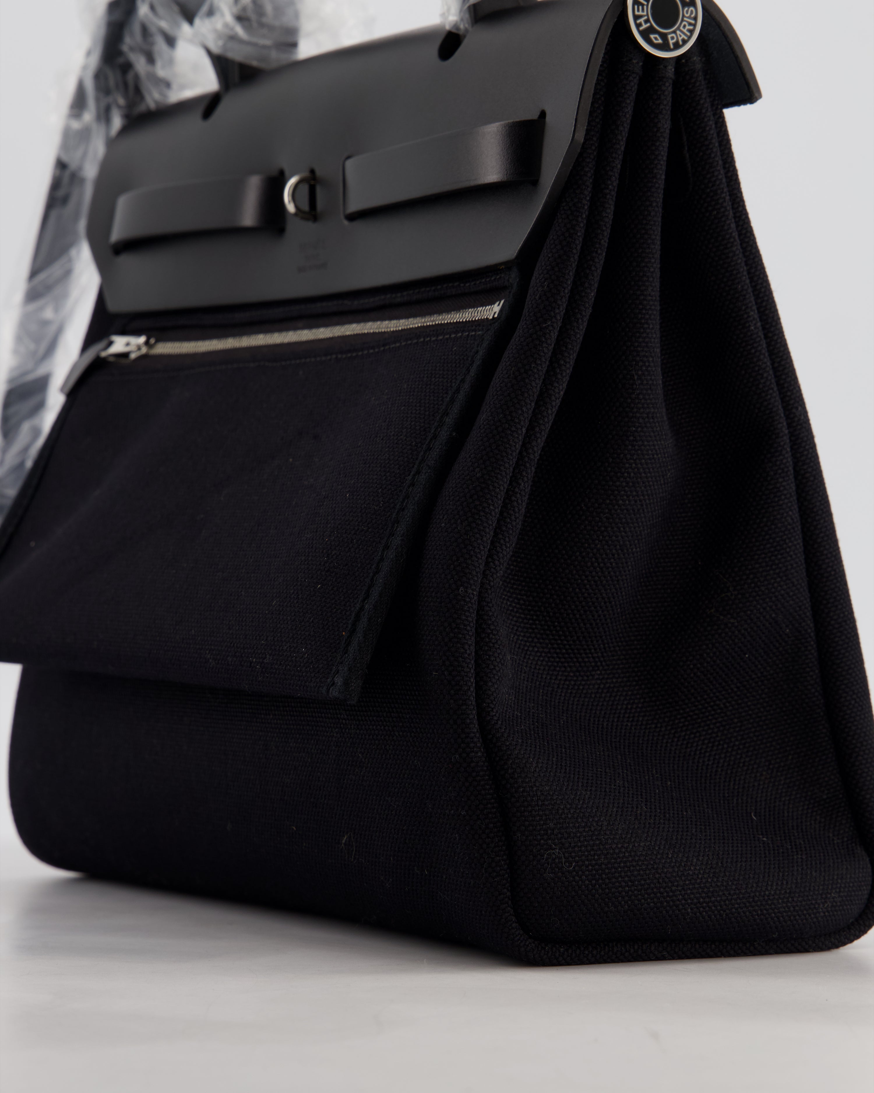 Hermès Herbag 31 Zip Bag in Noir Toile Officier Canvas, Noir Vache Hunter Leather with Palladium Hardware