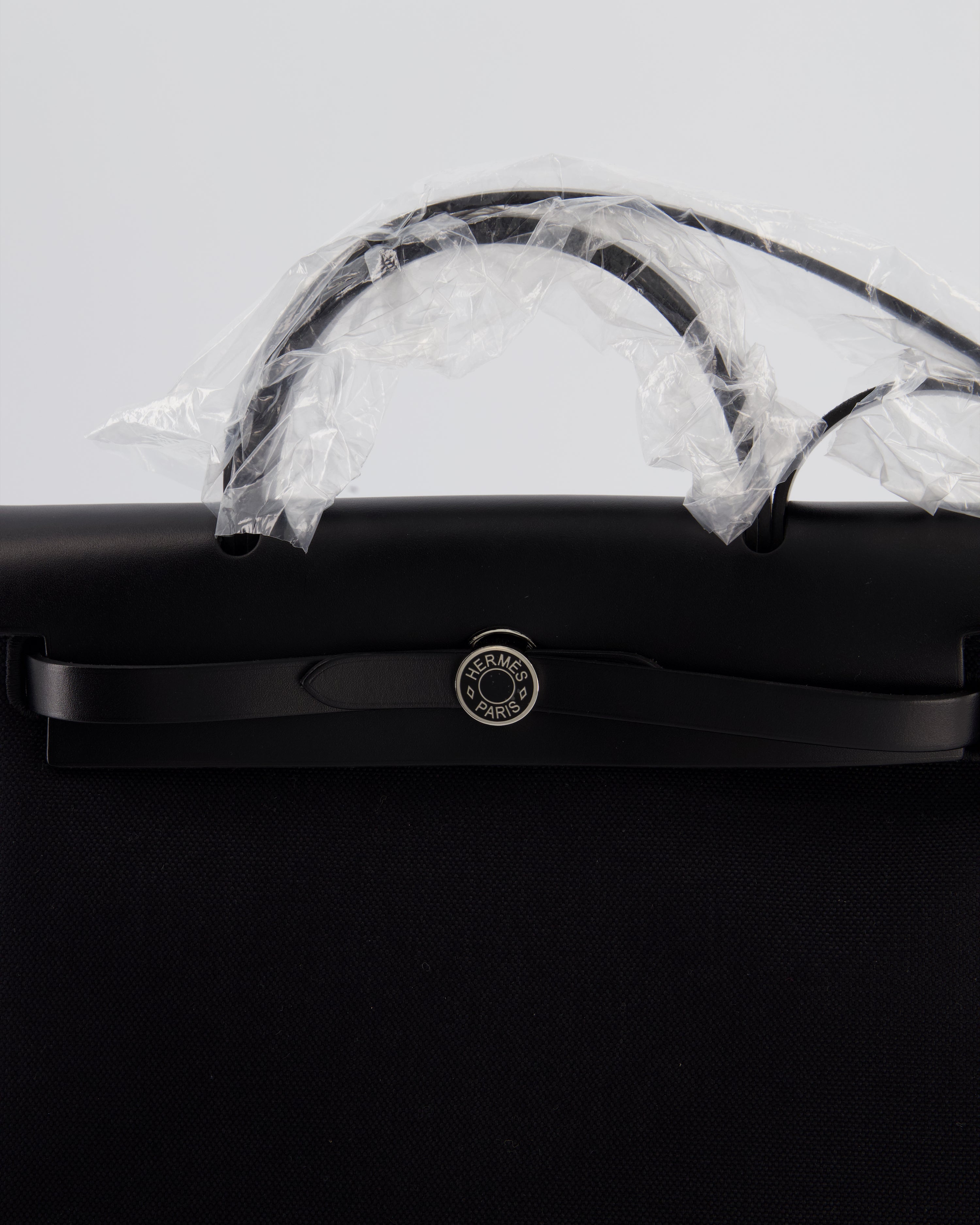 Hermès Herbag 31 Zip Bag in Noir Toile Officier Canvas, Noir Vache Hunter Leather with Palladium Hardware