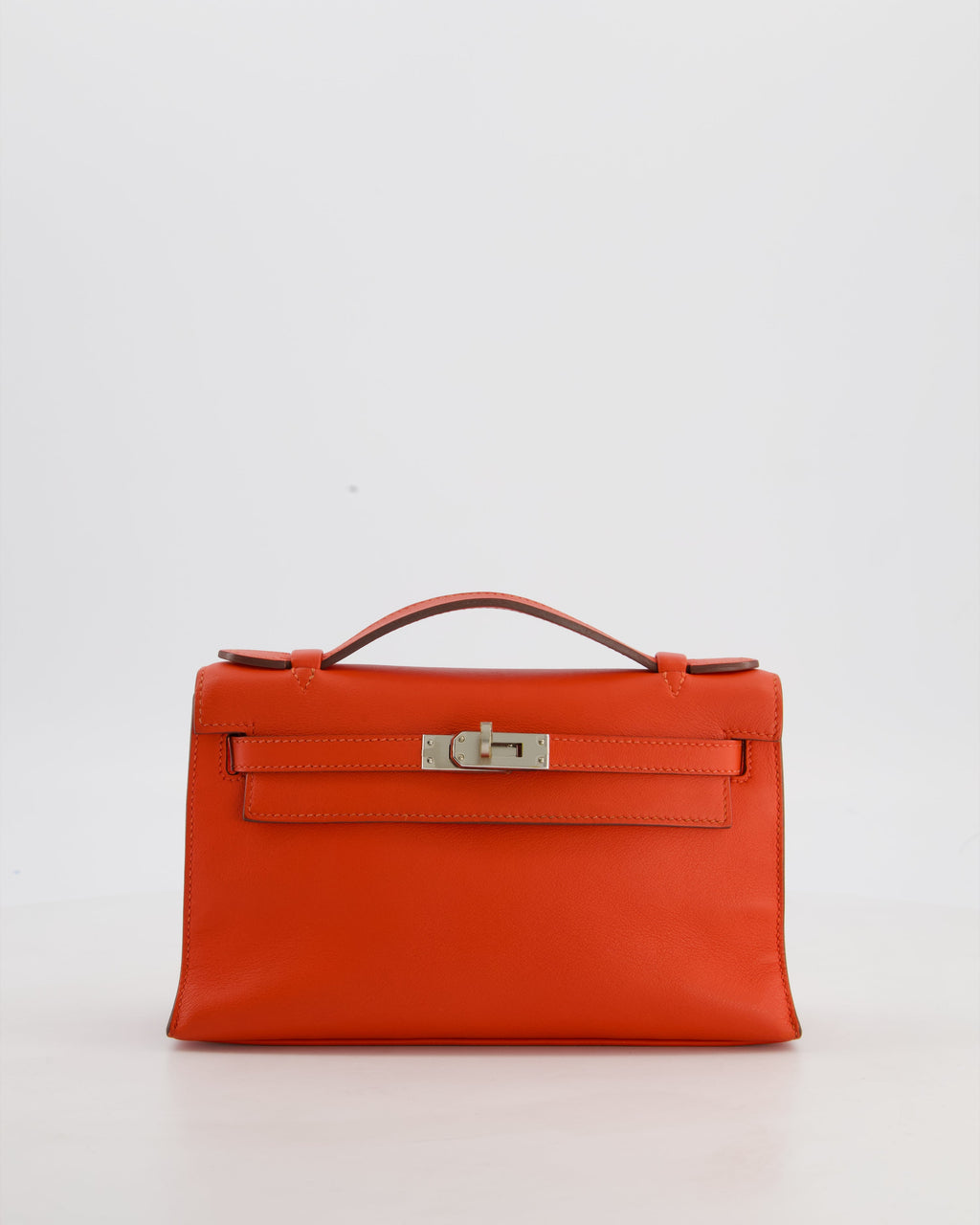 Hermès Kelly Pochette Bag in Capucine Swift Leather with Palladium Hardware